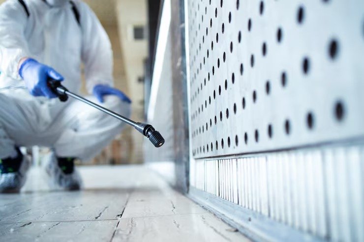 imageye___-_imgi_7_unrecognizable-person-white-chemical-protection-suit-doing-disinfection-public-areas-stop-spreading-highly-contagious-corona-virus_342744-869