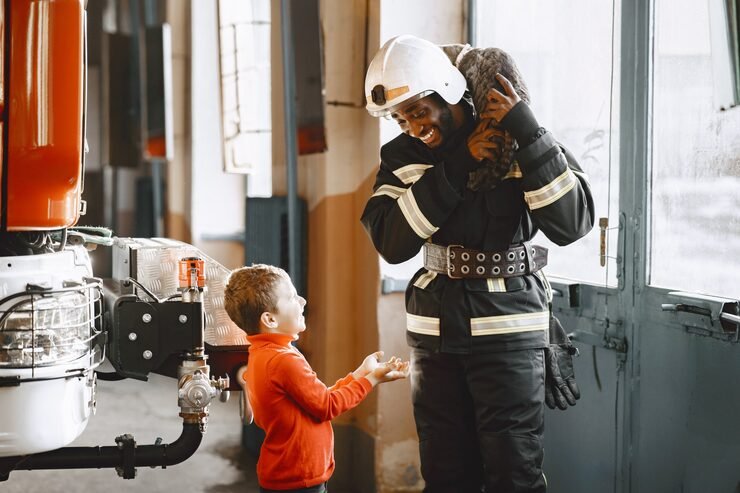 arfican-fireman-uniform-man-prepare-work-guy-with-child_1157-46928